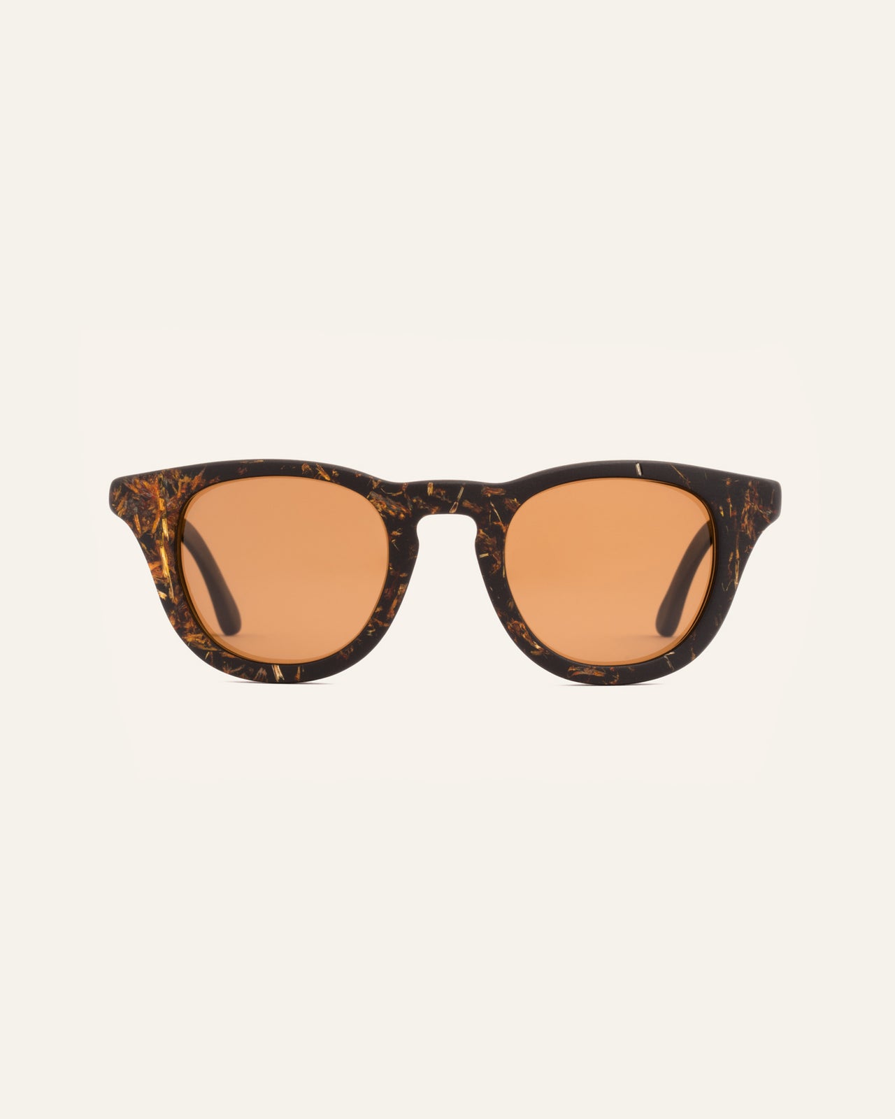 Laden Sie das Bild in den Galerie-Viewer, Stylish sunglasses with brown lenses, crafted from coffee-based frames with floral marigold petal accents.