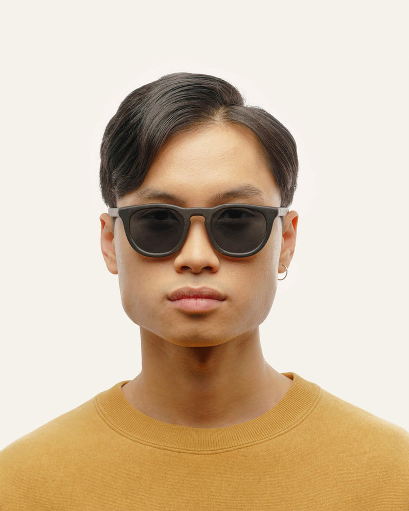 Anderson Black sunglasses on a white background, highlighting their minimalist and eco-friendly design
