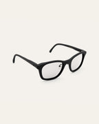 Side view of black optical frames, showcasing their sleek design and coffee-based eco-friendly materials
