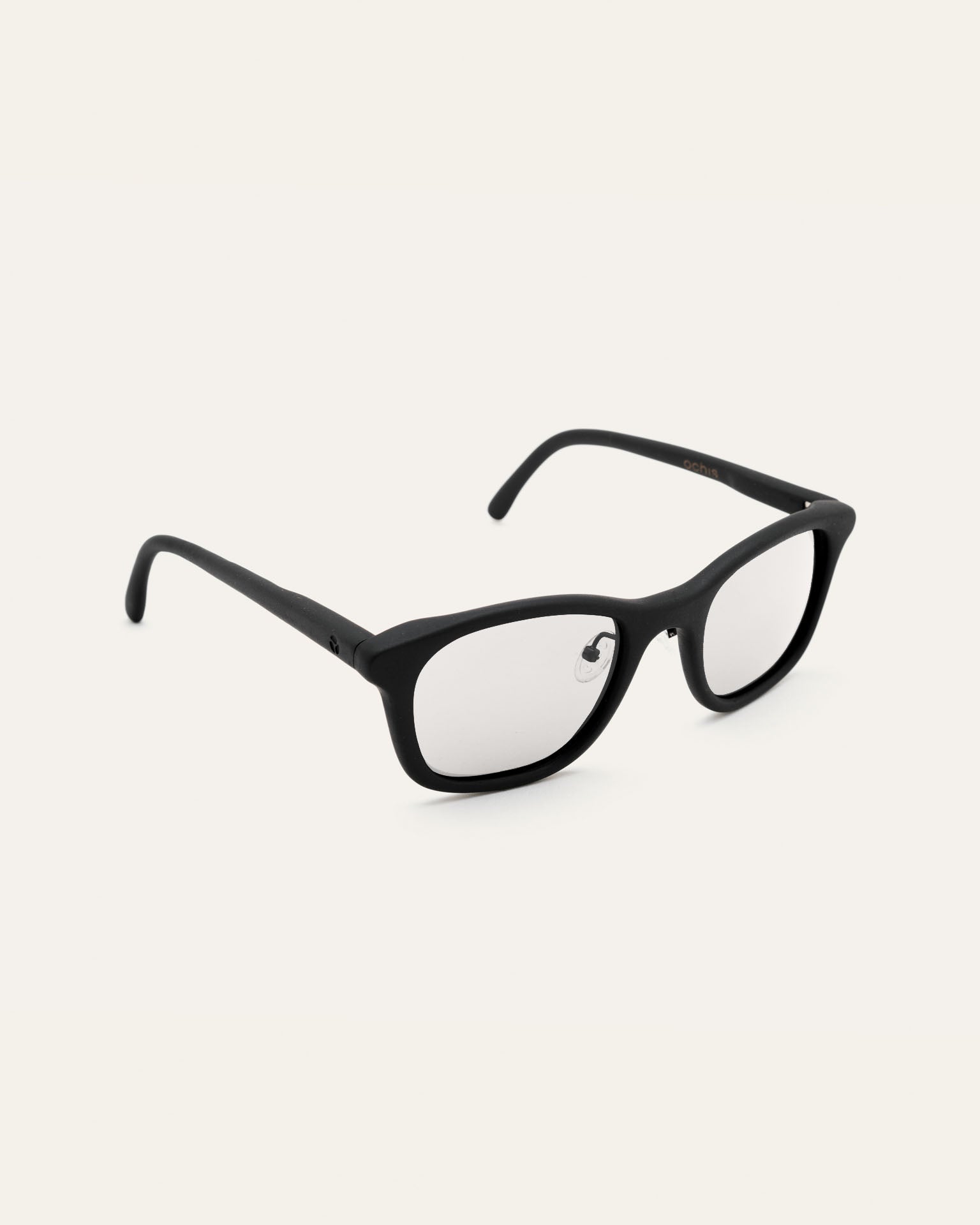 Side view of black optical frames, showcasing their sleek design and coffee-based eco-friendly materials