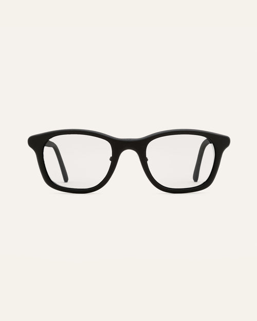 Man wearing lightweight black optical glasses, ideal for modern minimalists in Germany