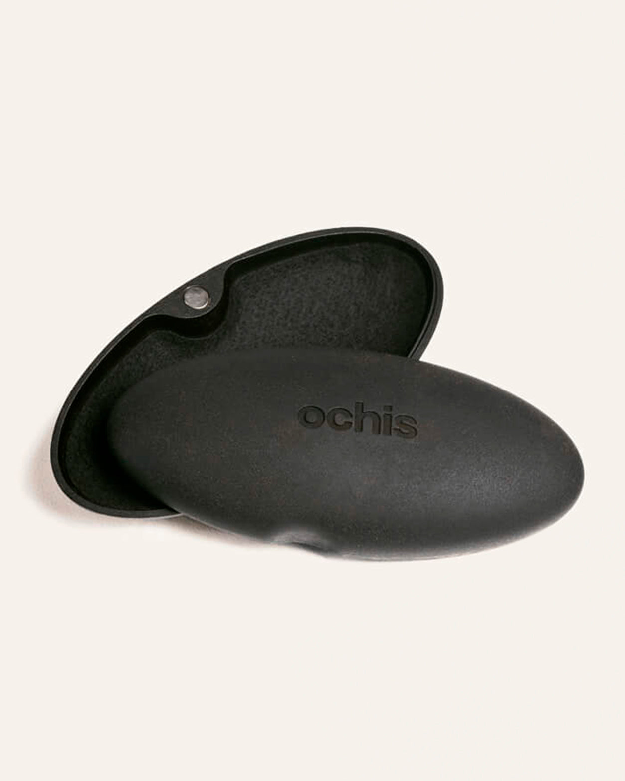 Open black coffee-based case with a smooth interior, designed to securely protect eyewear with a magnetic closure