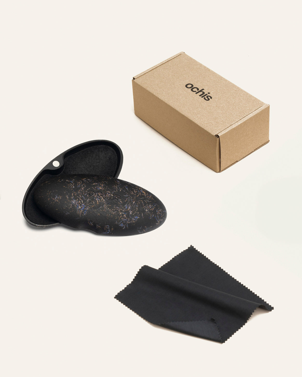 Open cornflower-adorned eyewear case with a soft interior, crafted from coffee biopolymers for secure and sustainable protection
