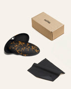 Sustainable glasses case with sunflower accents, paired with eco-friendly packaging for a complete and thoughtful design