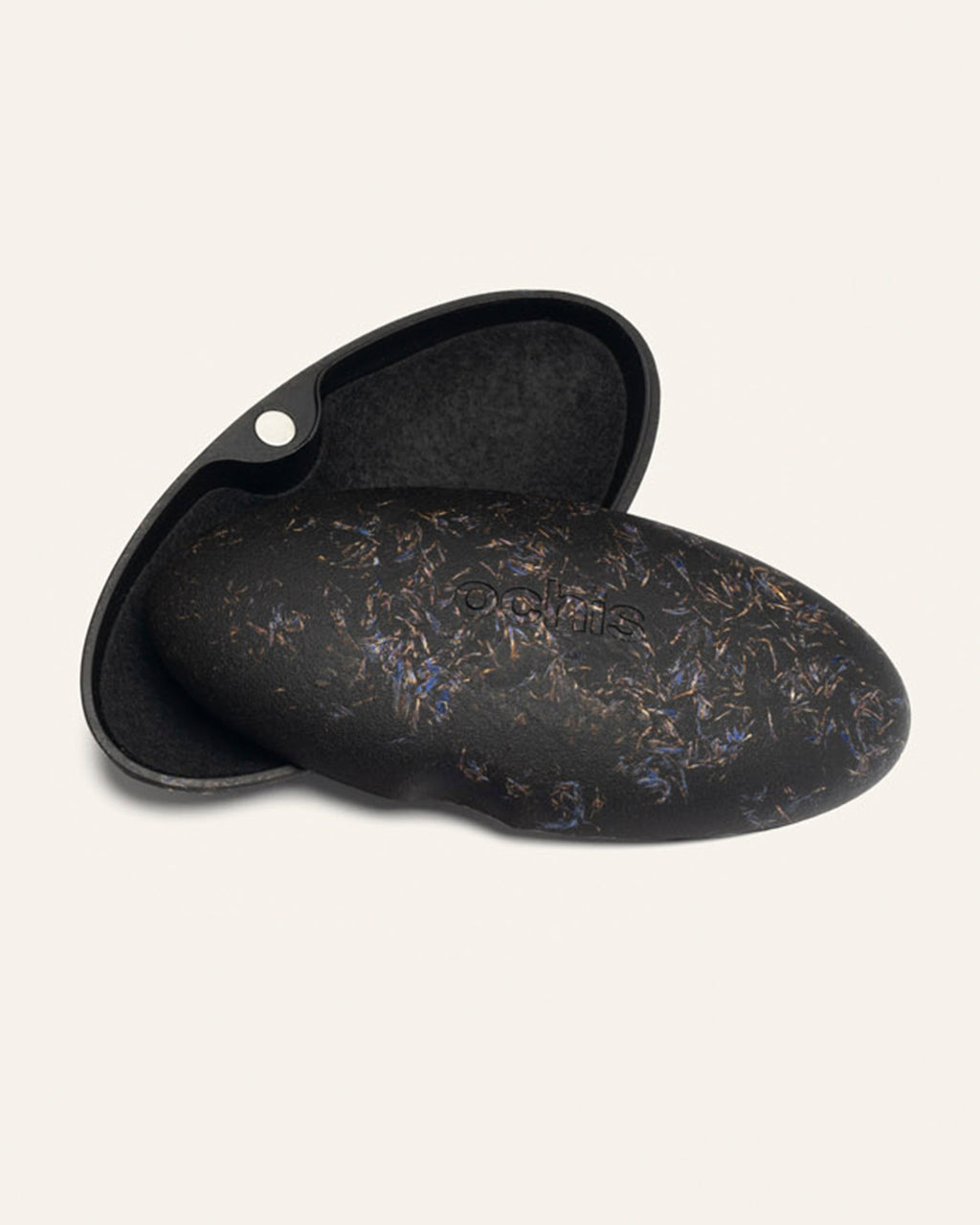 Black eco-friendly glasses case adorned with cornflower petals, highlighting its sustainable coffee-based design