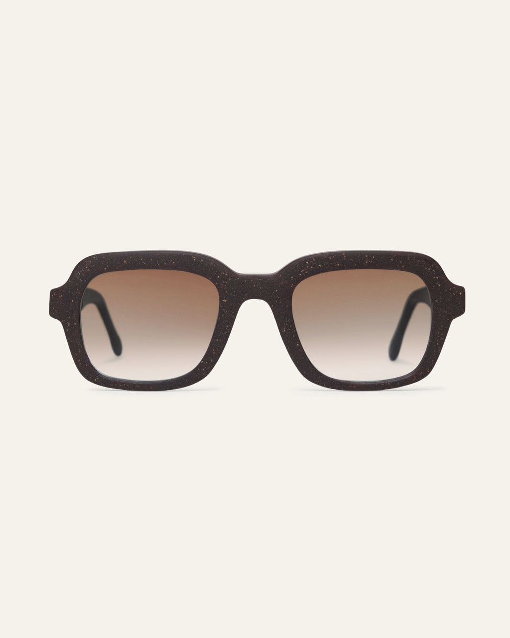 Front view of Lead Warm rectangular sunglasses with brown lenses and a brown coffee-based frame with visible walnut shell particles