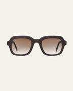 Front view of Lead Warm rectangular sunglasses with brown lenses and a brown coffee-based frame with visible walnut shell particles