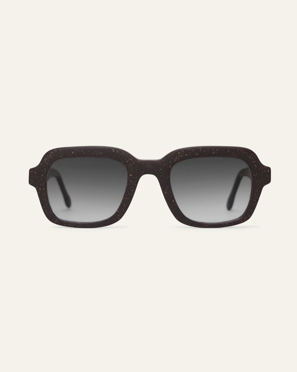 Front view of Lead Quiet rectangular sunglasses with gray lenses and a brown coffee-based frame with visible walnut shell particles
