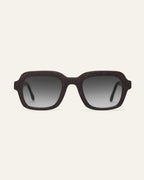 Front view of Lead Quiet rectangular sunglasses with gray lenses and a brown coffee-based frame with visible walnut shell particles