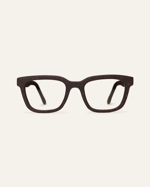 Front view of Velma Flax rectangular eyeglasses frame with visible flax straw particles on a light background