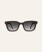 Front view of Move Quite rectangular sunglasses with gray lenses and a brown coffee-based frame with visible walnut shell particles