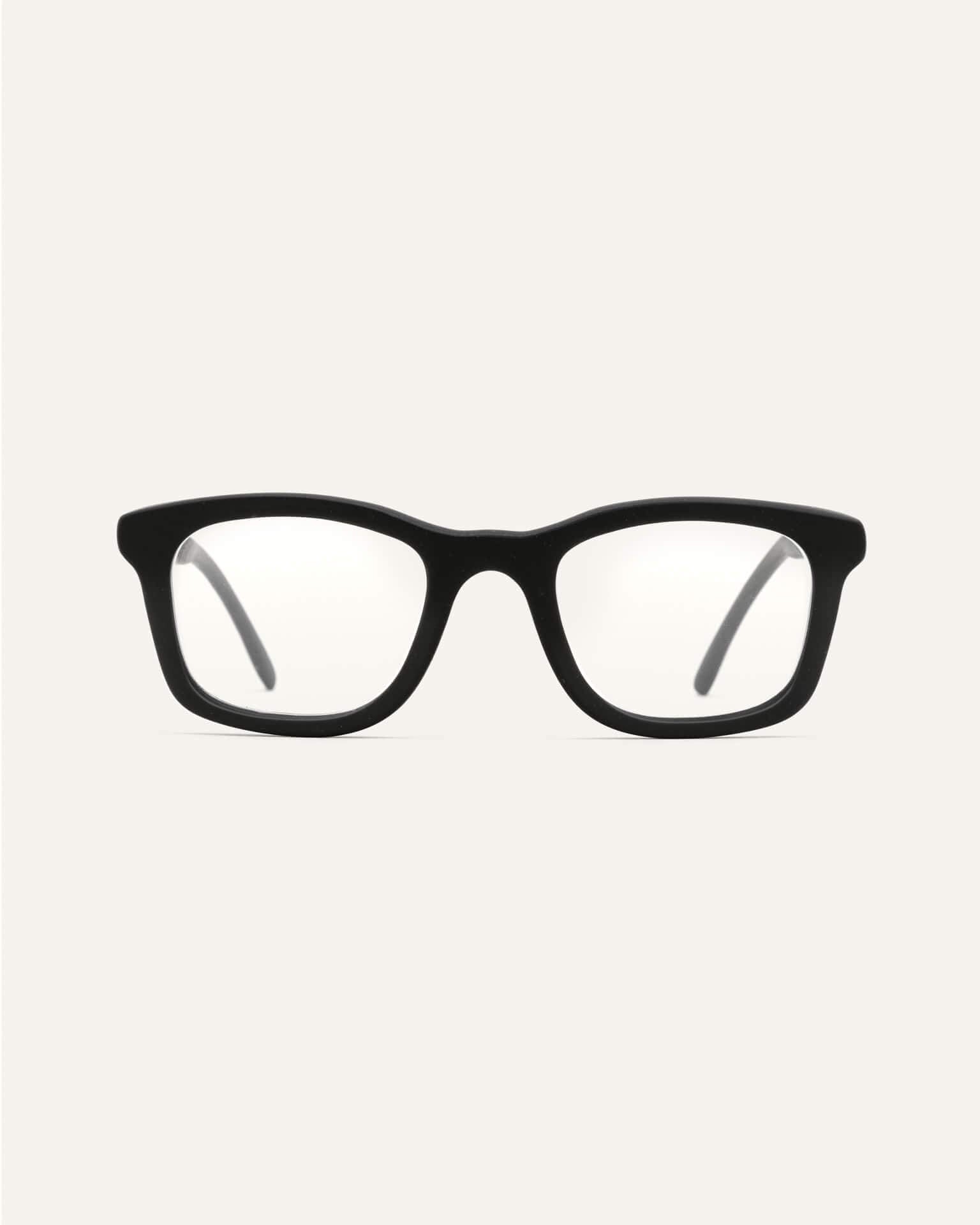 Dandy optical frames made from coffee materials, with a black front and flax-accented temples for corrective lenses