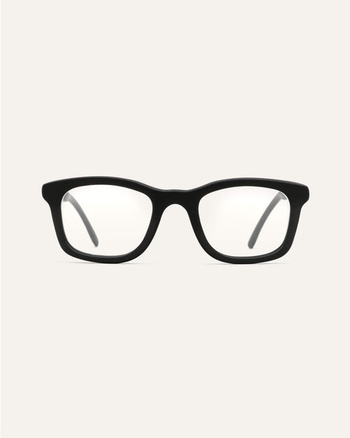 Dandy optical frames made from coffee materials, with a black front and flax-accented temples for corrective lenses