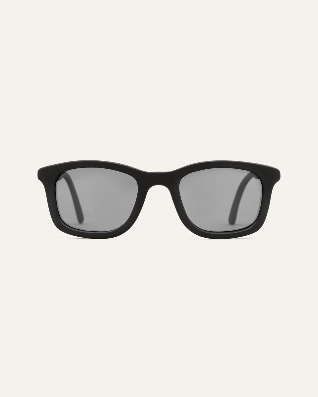 Close-up of sunglasses showcasing the black frame