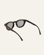 Angled view of stylish sunglasses, perfect for sunny days and eco-conscious fashion enthusiasts.