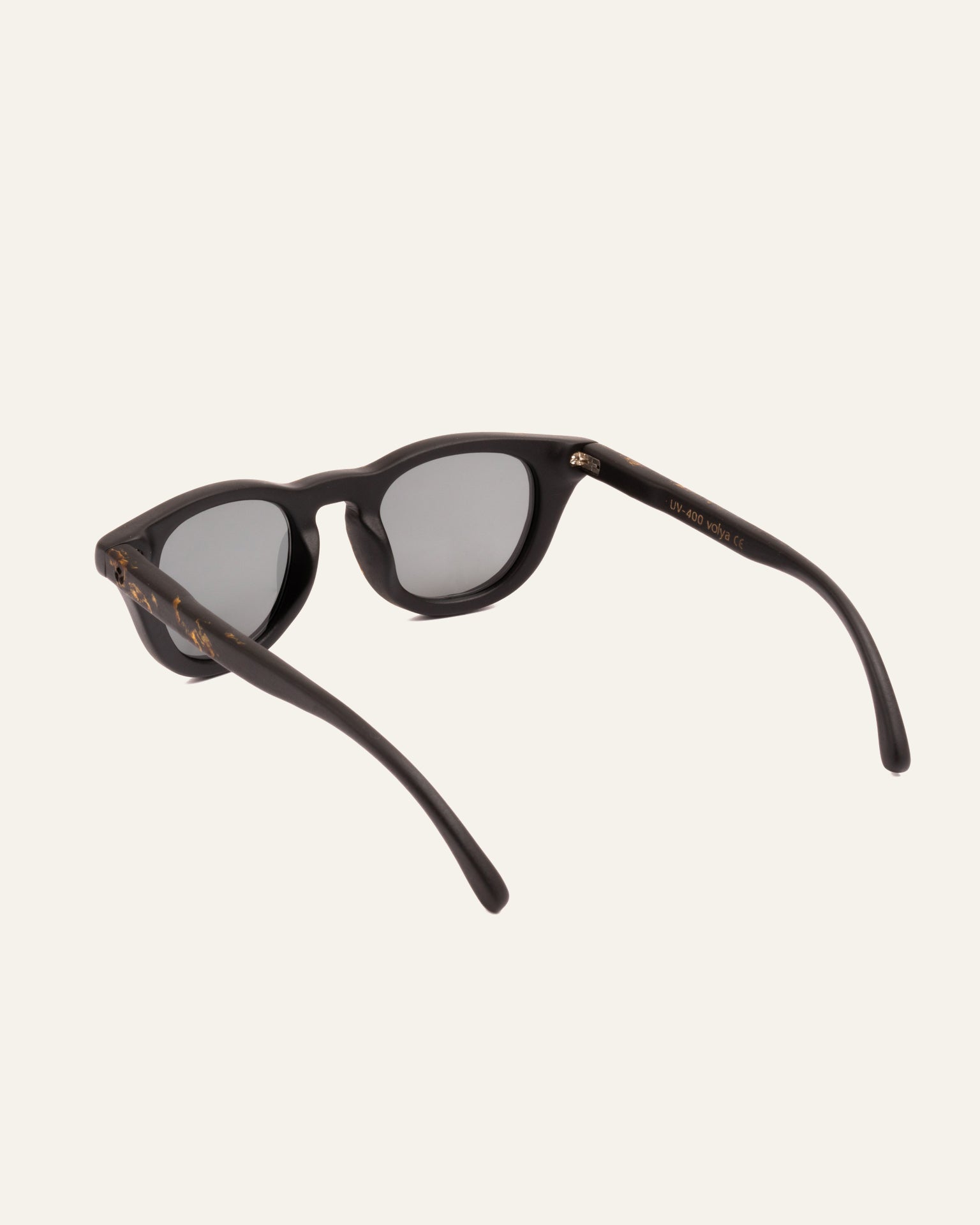 Angled view of stylish sunglasses, perfect for sunny days and eco-conscious fashion enthusiasts.