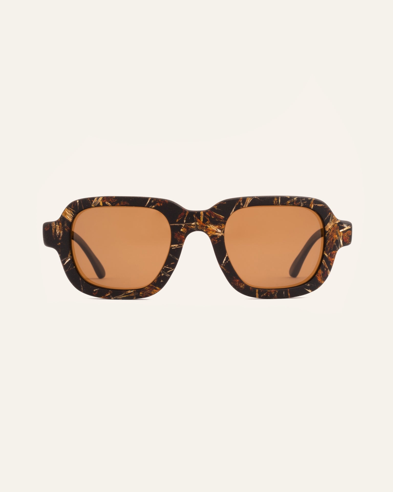 Sunglasses with brown lenses and a marigold-accented coffee-based frame