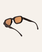 Side view of eco-friendly sunglasses with a rich coffee texture