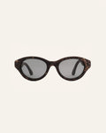 Biobased eco-friendly sunglasses with gray polarized lenses, featuring a coffee frame accented with cornflower petals