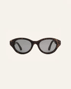 Biobased eco-friendly sunglasses with gray polarized lenses, featuring a coffee frame accented with cornflower petals