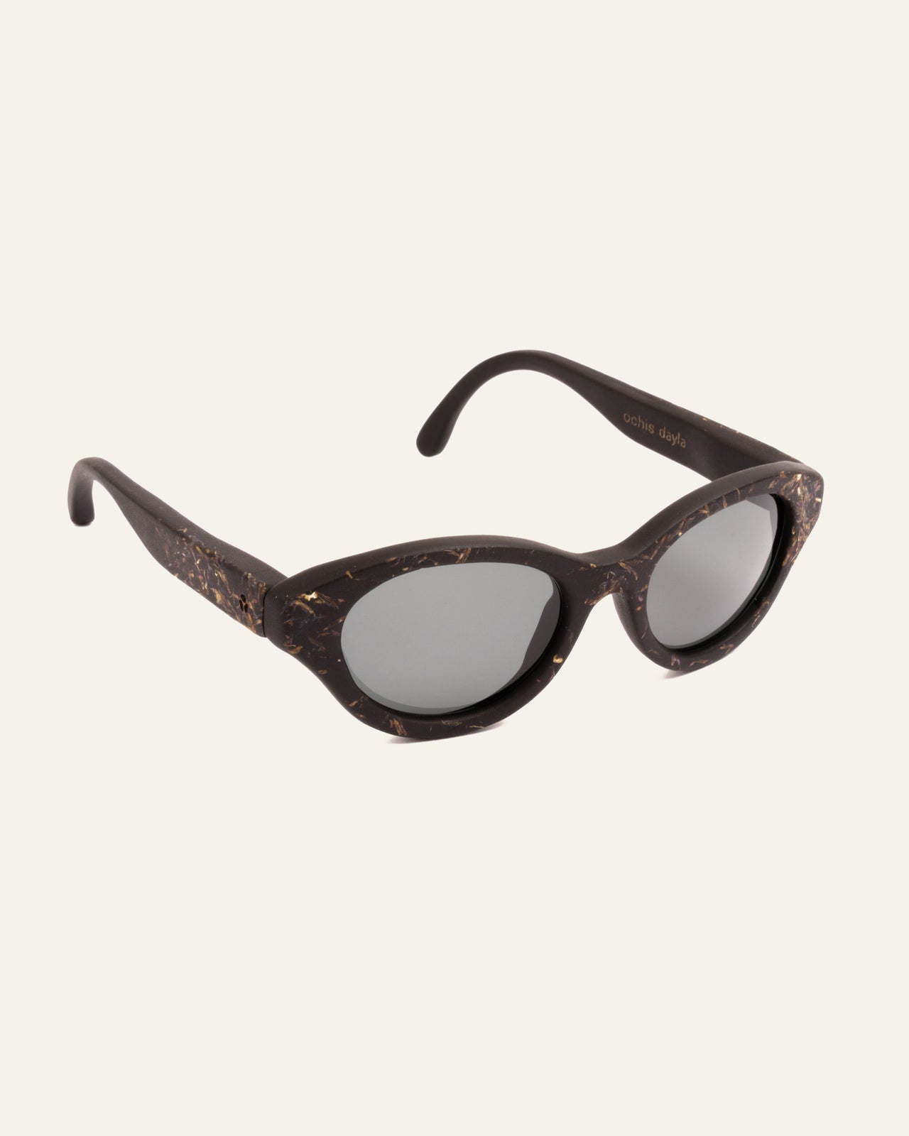 Load image into Gallery viewer, Side angle of lightweight sunglasses made from coffee and adorned with unique cornflower accents

