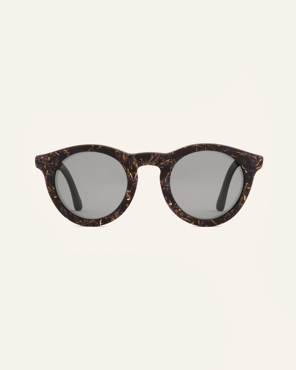 Front view of Kole Krasa sunglasses with gray polarized lenses and coffee-based frames adorned with light-blue cornflower petals