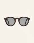 Front view of Kole Krasa sunglasses with gray polarized lenses and coffee-based frames adorned with light-blue cornflower petals