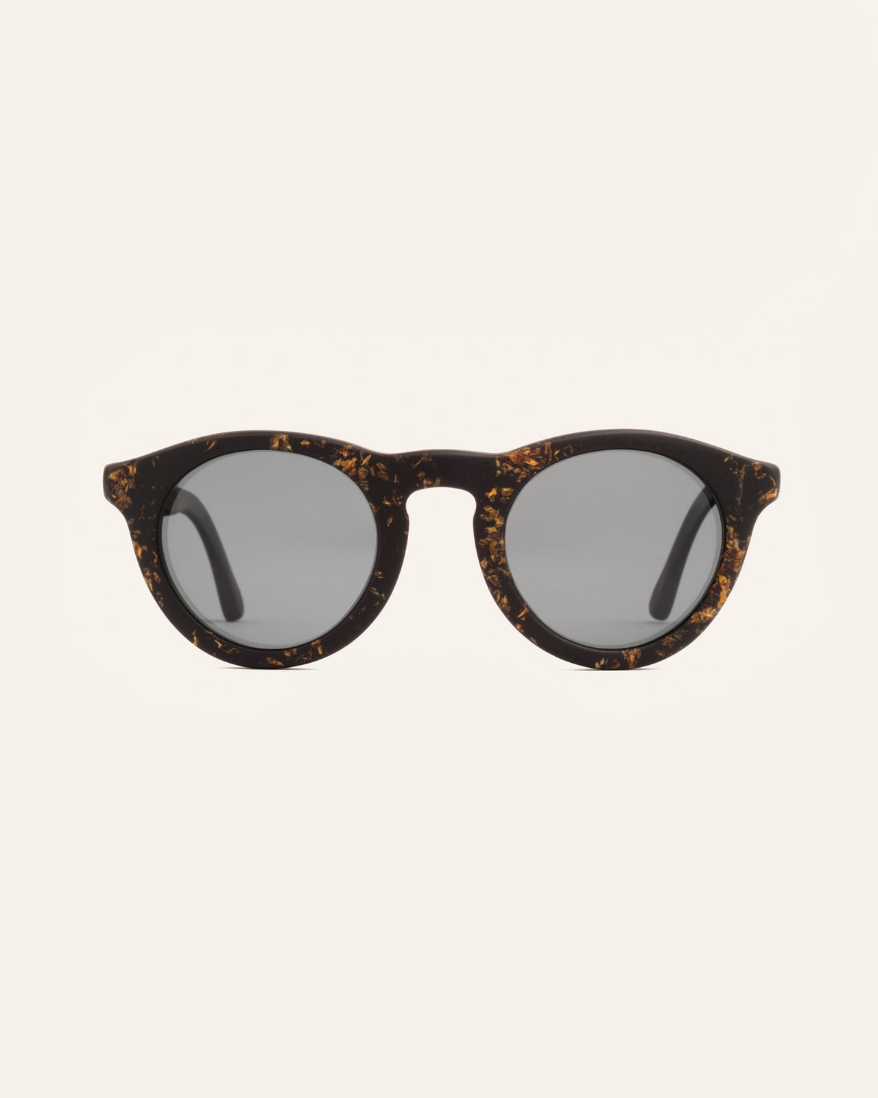 Load image into Gallery viewer, Front view of Kole Volya sunglasses with gray polarized lenses, featuring coffee-based frames adorned with sunflower petals
