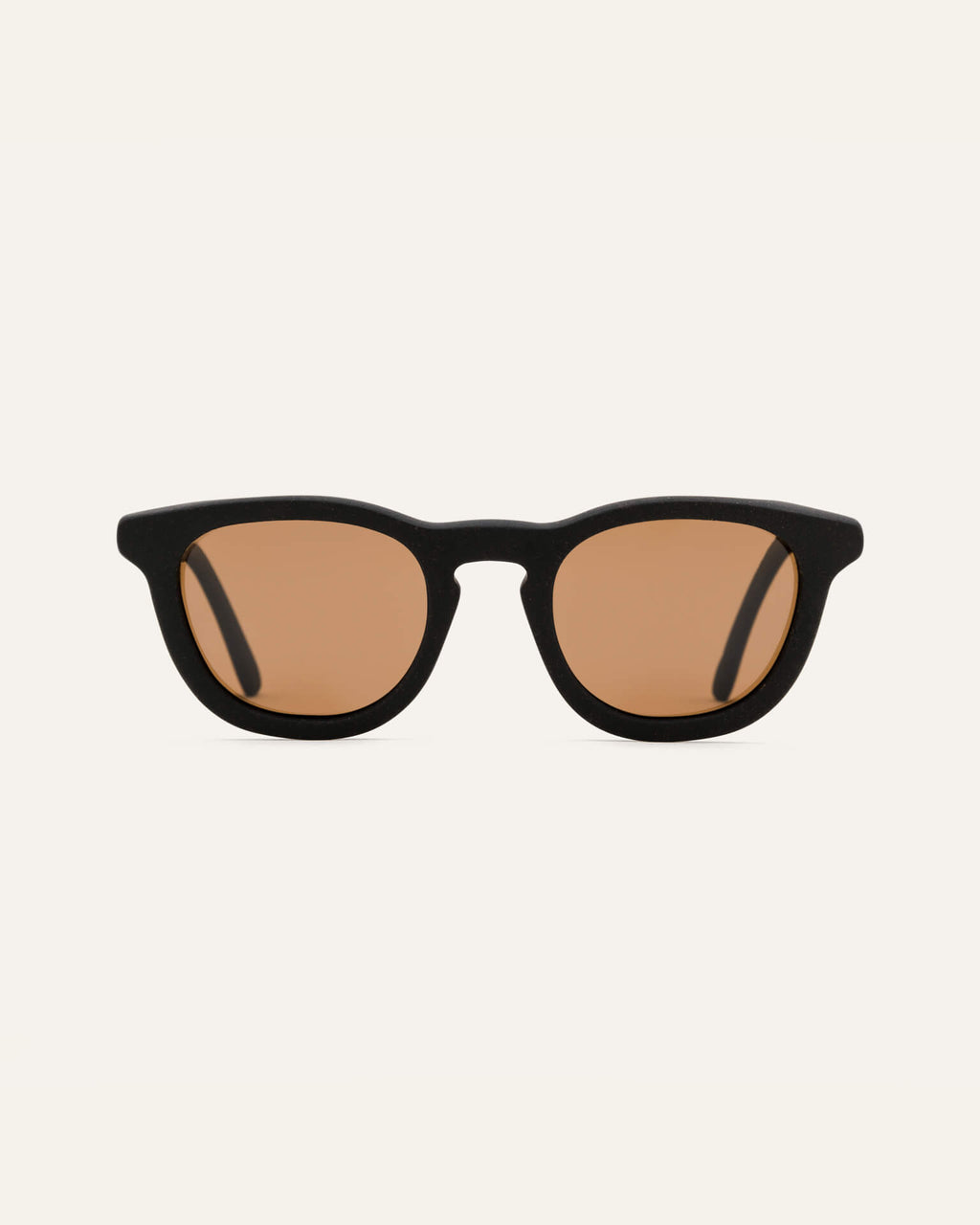 Anderson Black sunglasses with brown lenses on a white background, highlighting their minimalist and eco-friendly coffee-based design