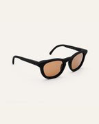 Anderson Black sunglasses with brown lenses in a side-angle view, demonstrating their lightweight and durable construction.