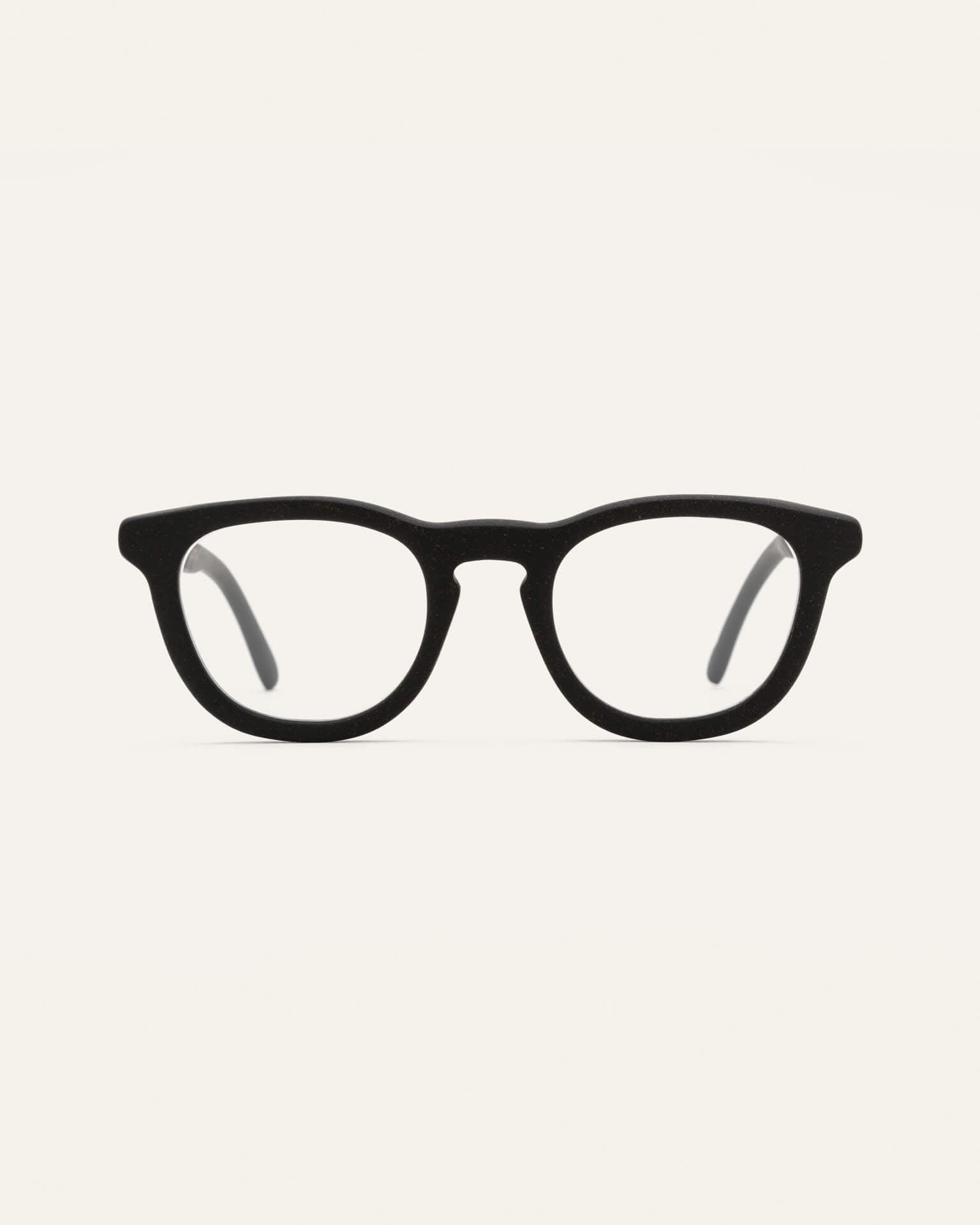 Anderson Black optical frames on a white background, highlighting their minimalist and sustainable craftsmanship
