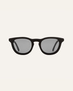Anderson Black sunglasses on a white background, highlighting their minimalist and eco-friendly design
