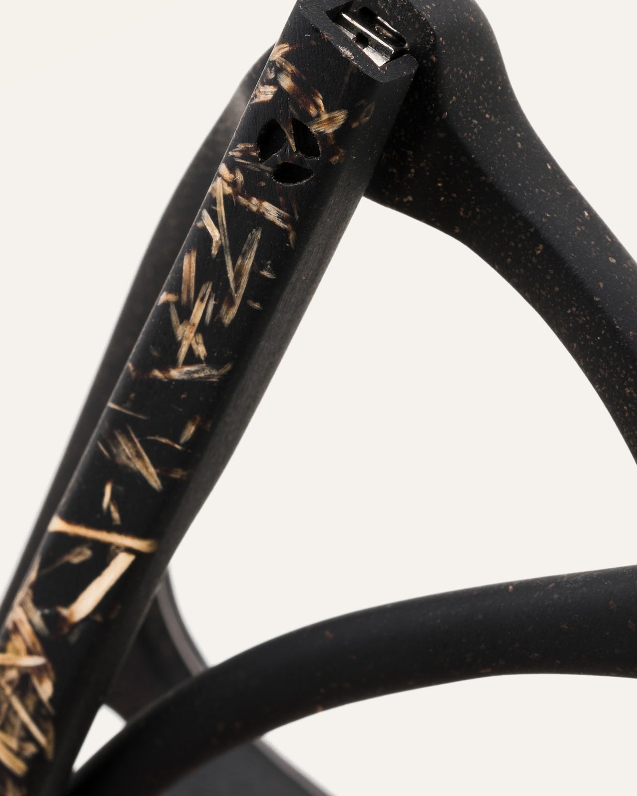 Load image into Gallery viewer, Close-up of black eyeglasses, featuring intricate eco-friendly details on the frame.
