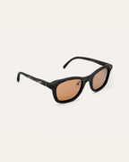 Side view of lightweight black sunglasses with flax-enhanced frames, crafted for fashion-forward minimalists.