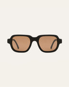 Ochis Brade sunglasses with warm brown lenses, crafted from coffee-based materials, displayed on a clean background.