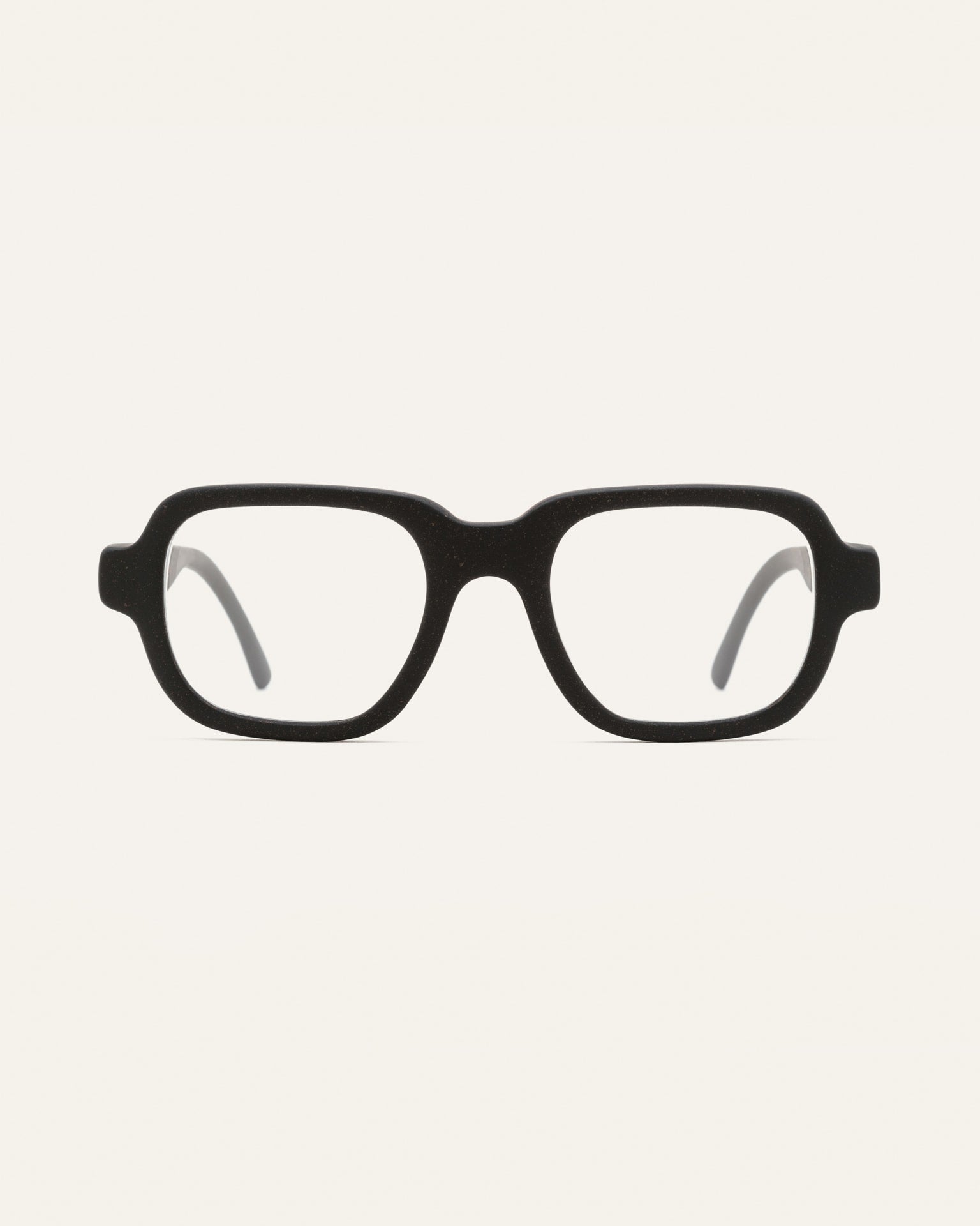 Black optical frames crafted from coffee-based materials, displayed on a neutral background.