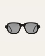 Ochis Brade coffee-based sunglasses with sleek gray lenses displayed against a neutral background