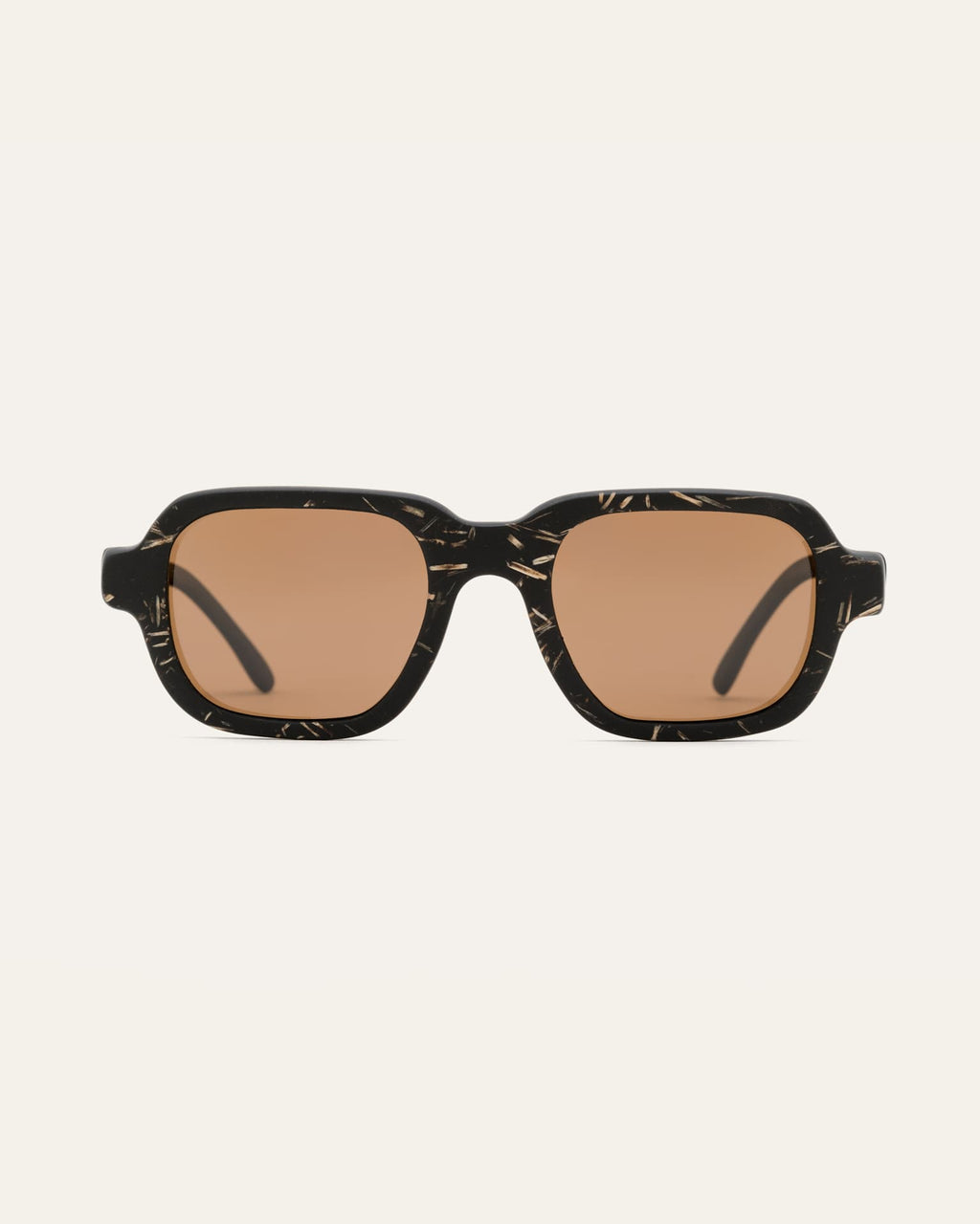 Sunglasses with black coffee-based frames and brown lenses on a white background