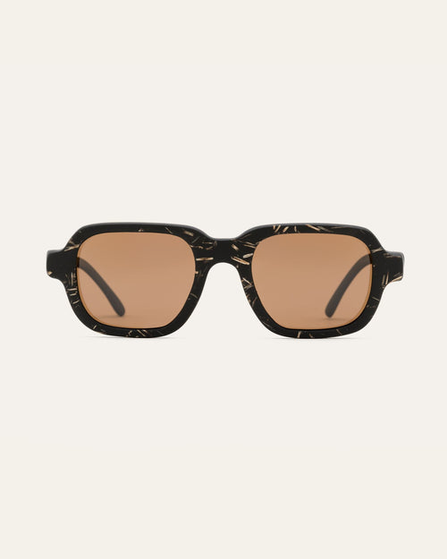 Sunglasses with black coffee-based frames and brown lenses on a white background