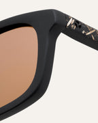 Close-up of the flax-textured temples and coffee-based frame, paired with warm-toned lenses for a natural look
