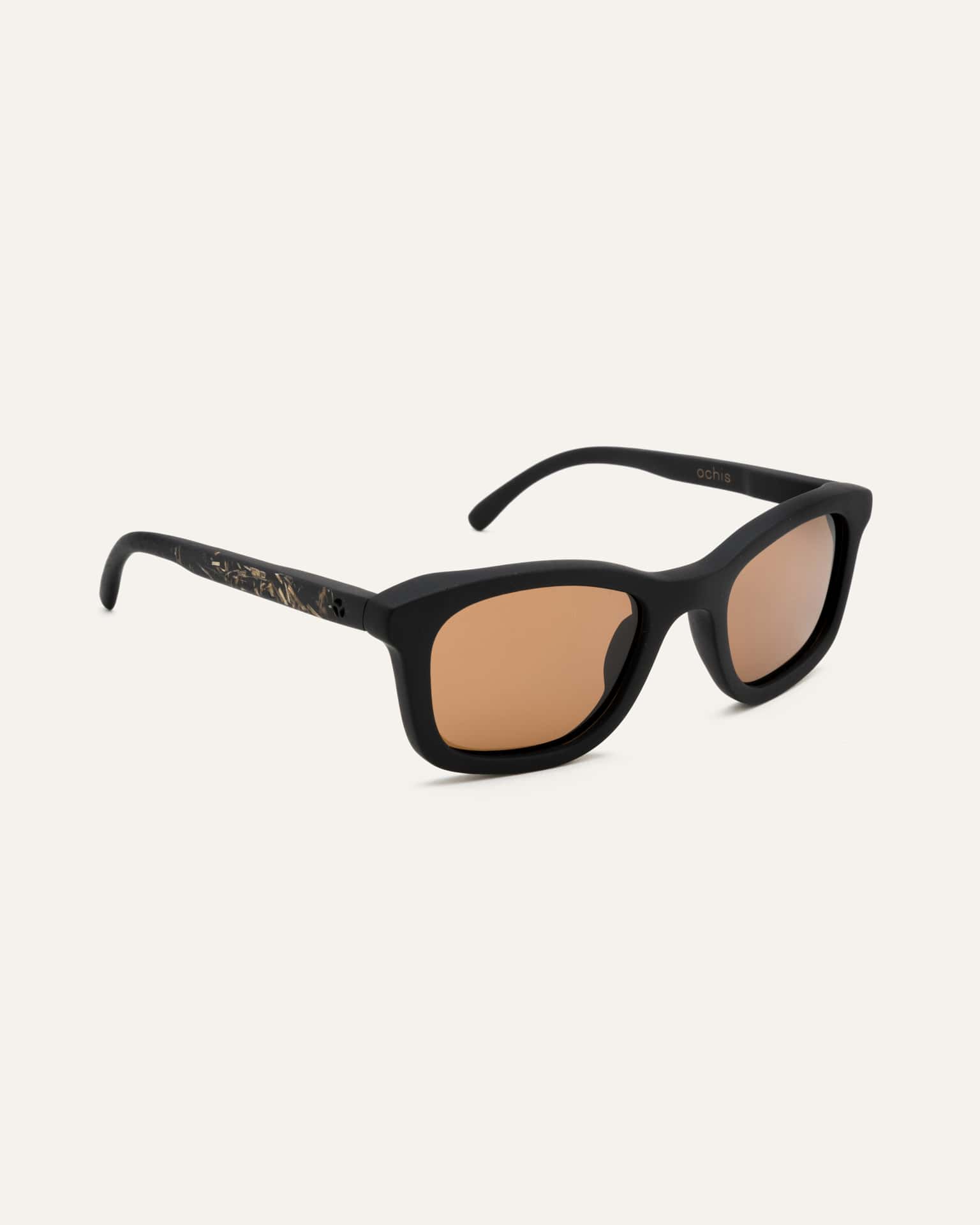 Side view of the sunglasses with flax-covered temples, showcasing their lightweight and natural construction.