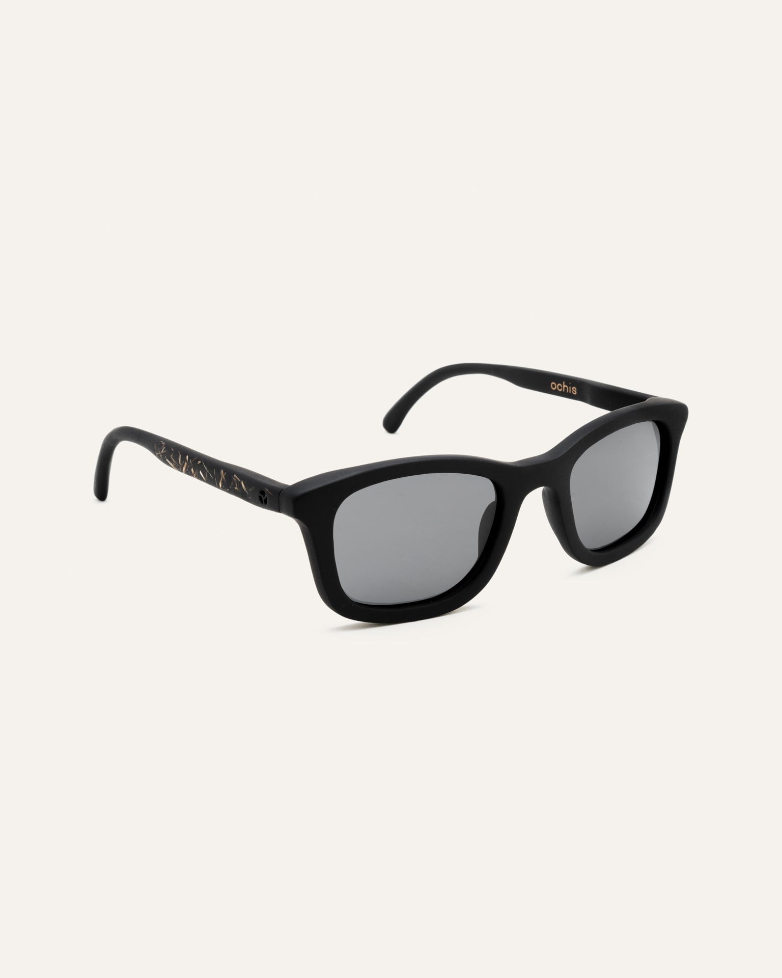 Coffee-based sunglasses with gray lenses, side view emphasizing lightweight design.