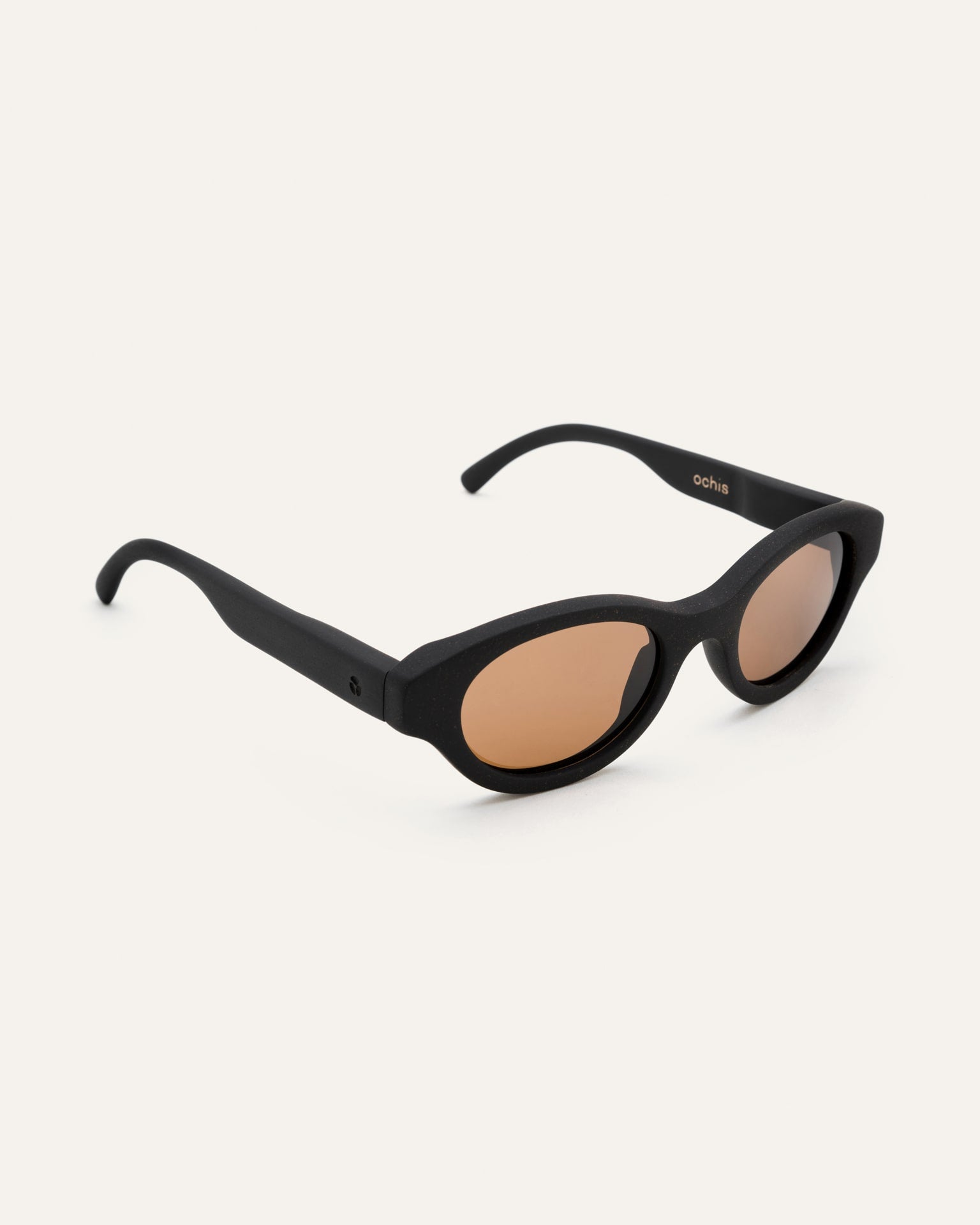Lightweight Dayla sunglasses in a side view, crafted from coffee biopolymers and featuring brown lenses for eco-conscious living