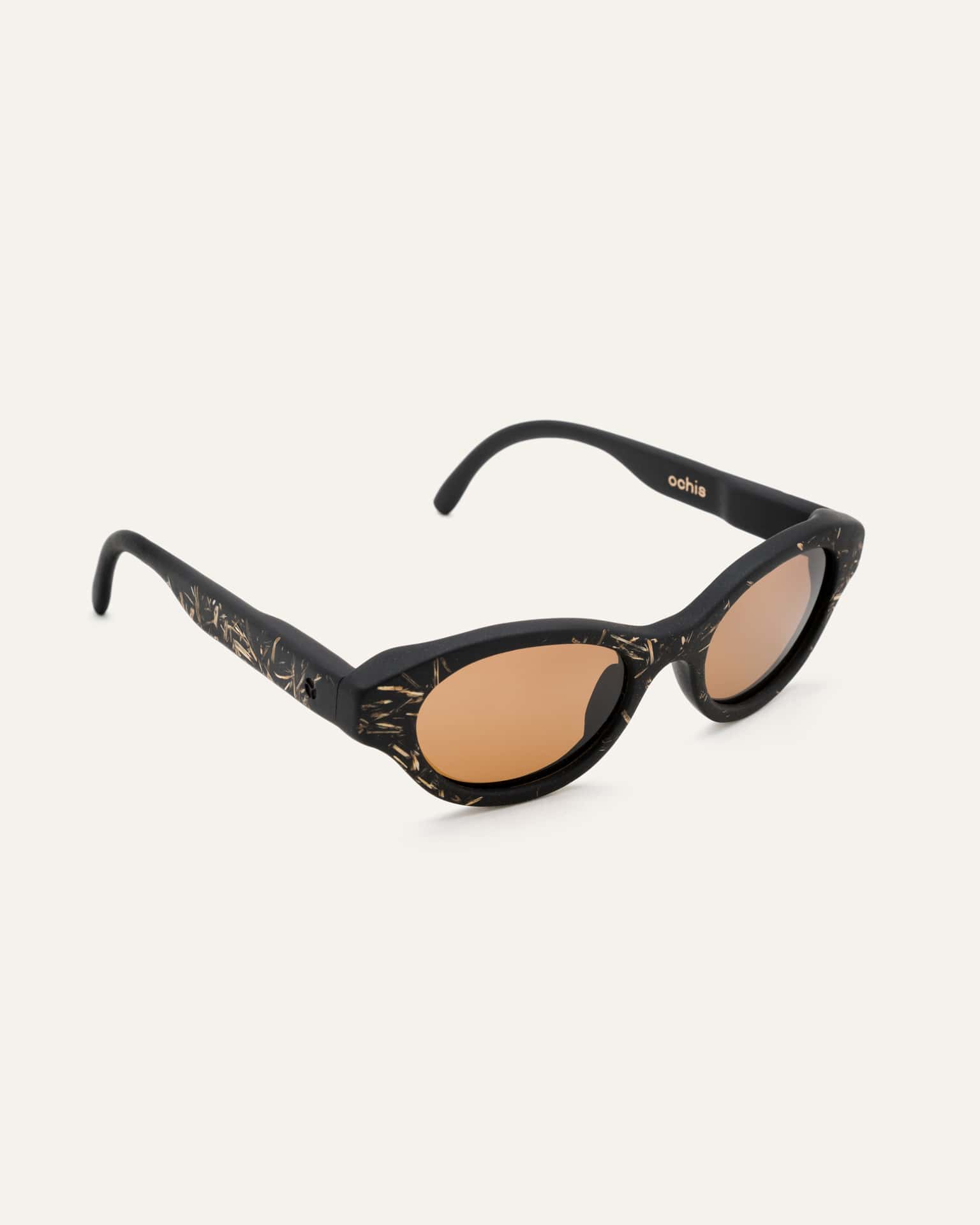 Angled shot of lightweight sunglasses made from coffee and flax, ideal for sustainable living