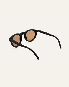 tinted sunglasses with brown round lenses